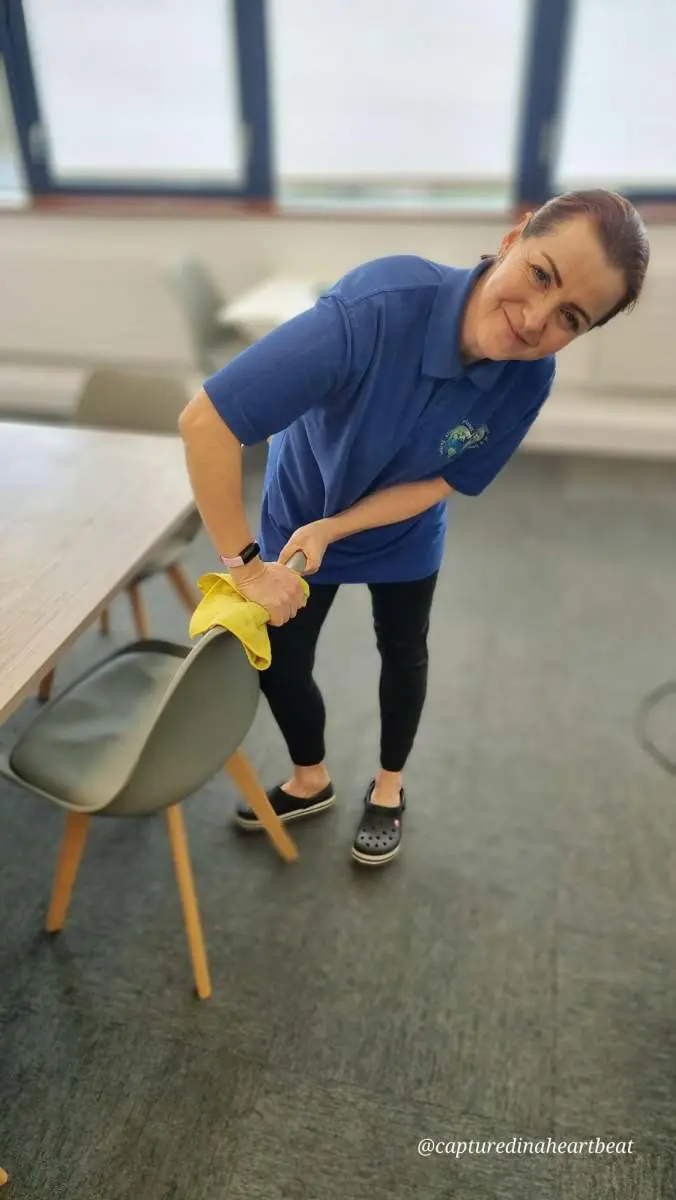 Cleaning With Meaning cleaner wiping a dining chair in a Maidstone home